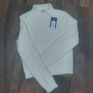 Elegant Cream Turtleneck Sweater